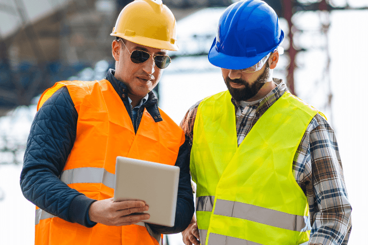 contractor in front of a tablet&nbsp;