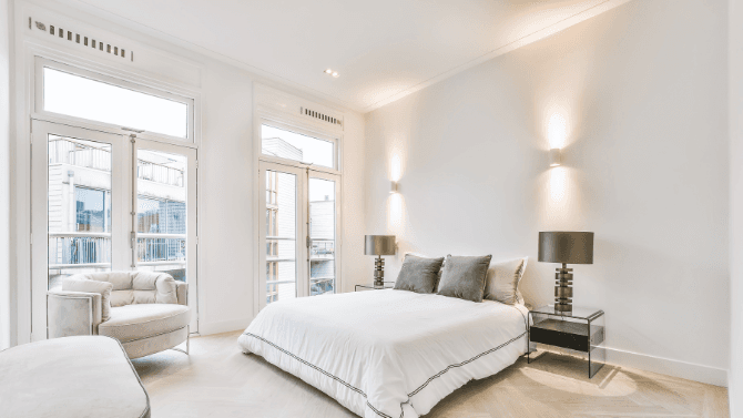 Bedroom with high ceiling