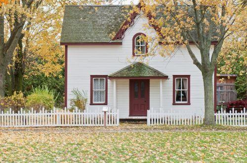 old home with siding and roof shingles