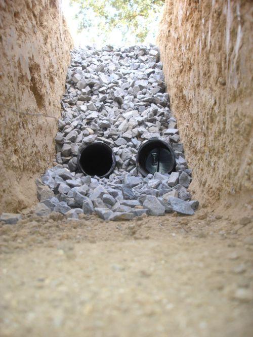 Rock pile on drain