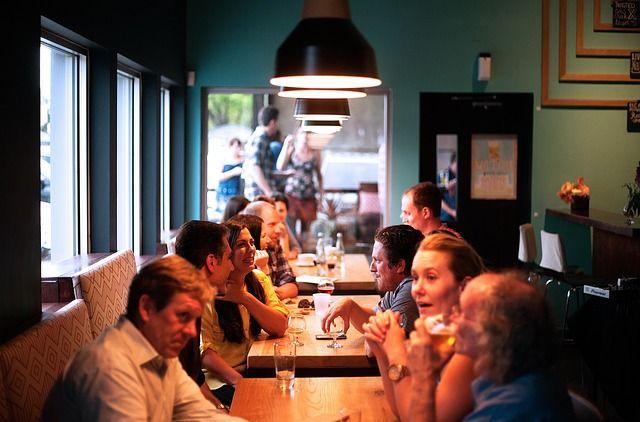 people eating at a restaurant_Restaurant renovation: tips and ideas_Reno Quotes