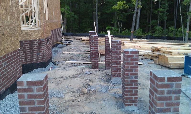 Brick balcony and siding relating to masonry services