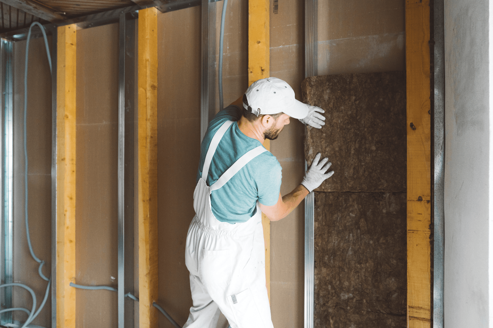 contractor insulating a basement